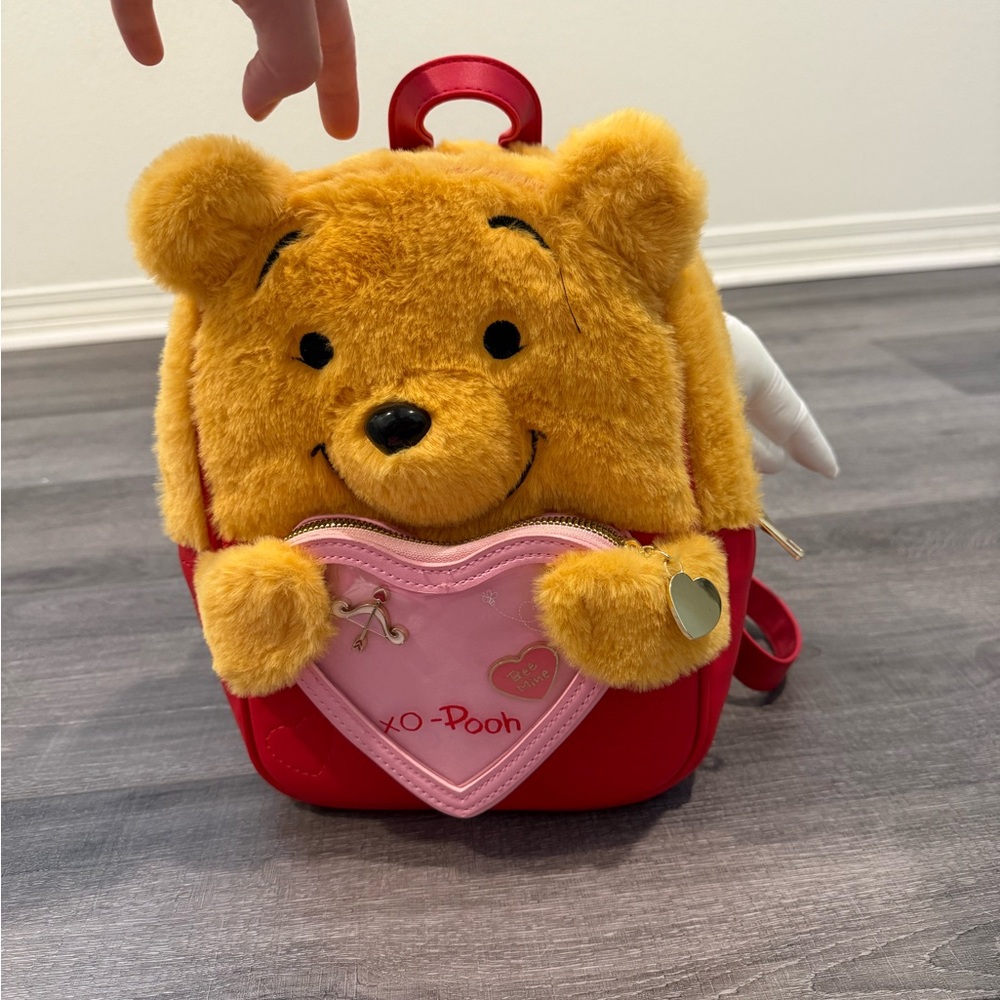 Her Universe Winnie the Pooh Plush Backpack in Yellow, Red & Pink